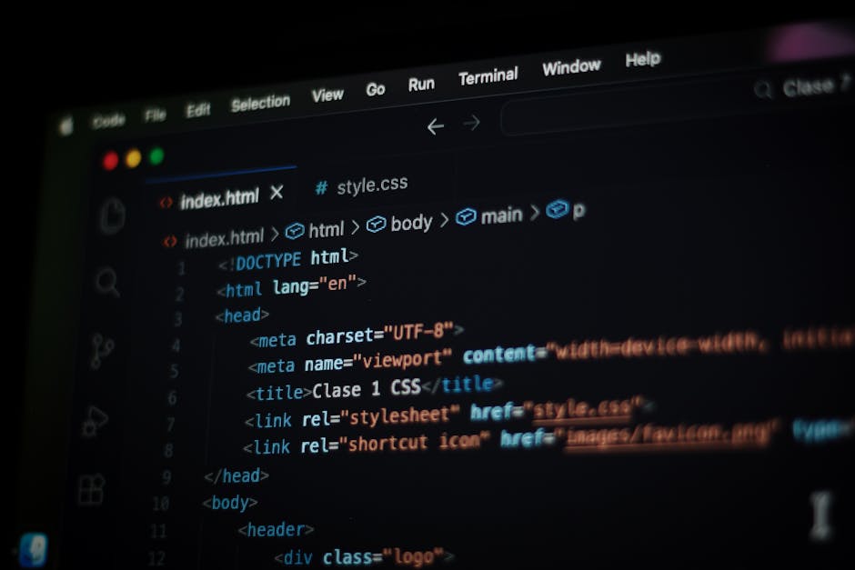 A computer screen displaying HTML code with visible tags such as <html>, <head>, <title>, and <body>, with syntax highlighting in shades of blue, red, and orange on a dark background. The code is part